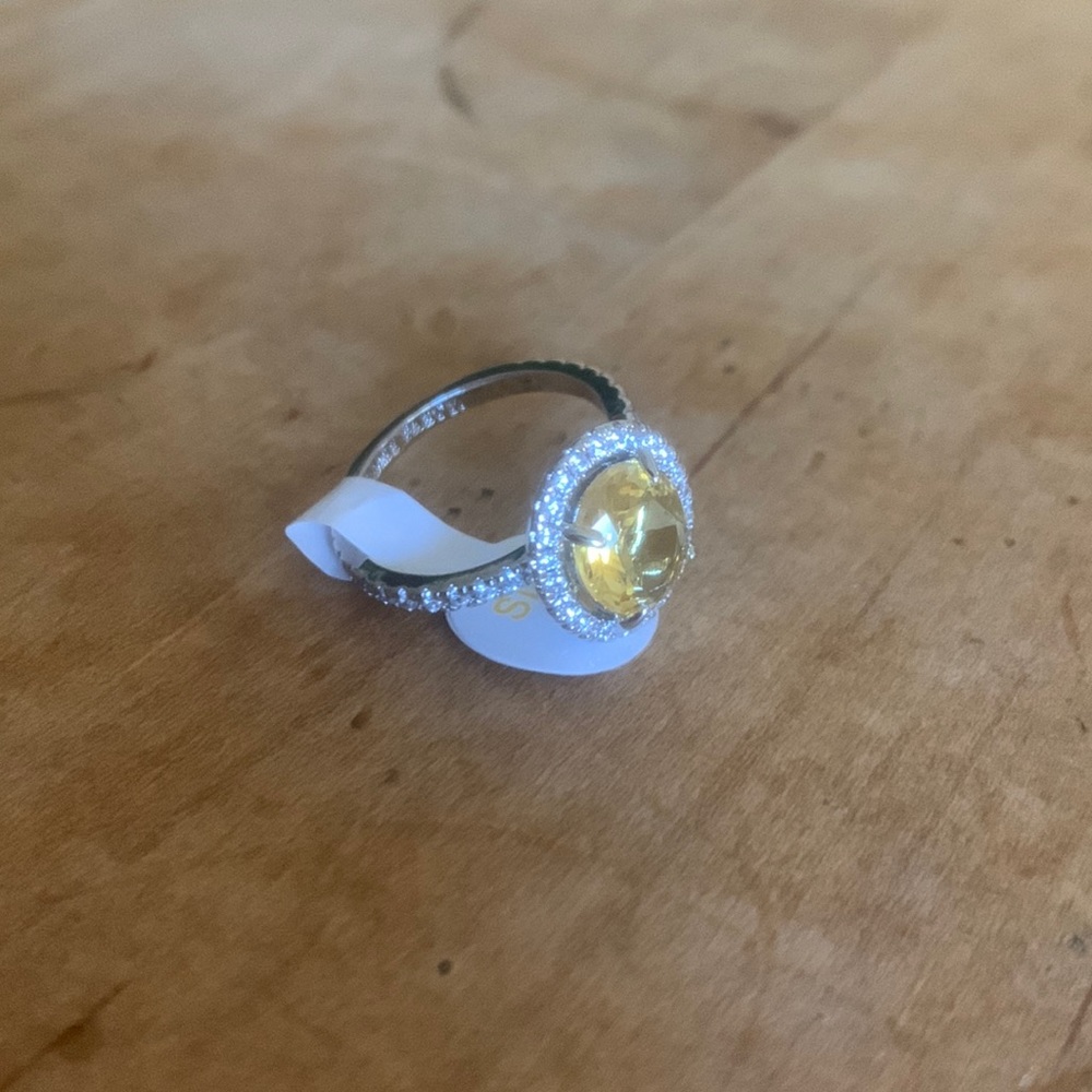 Citrine, rhodium platinum. Size 7.